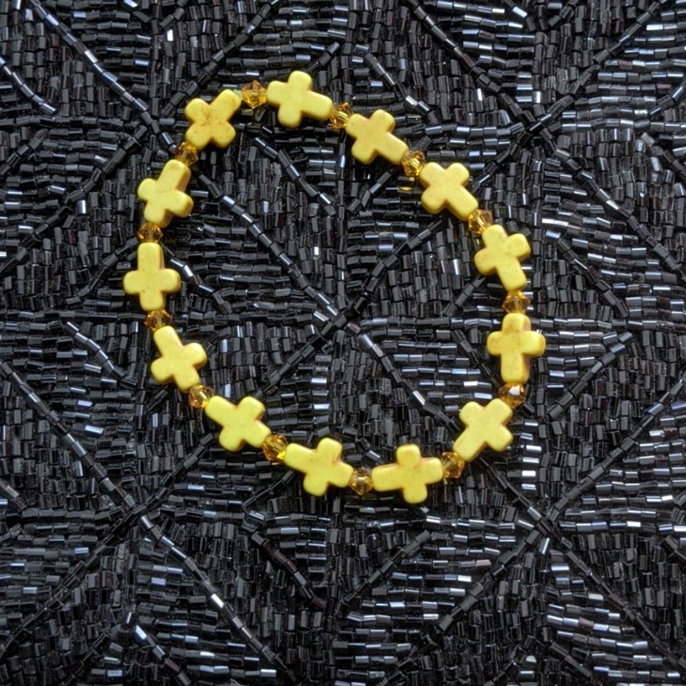 Yellow gold cross bracelet